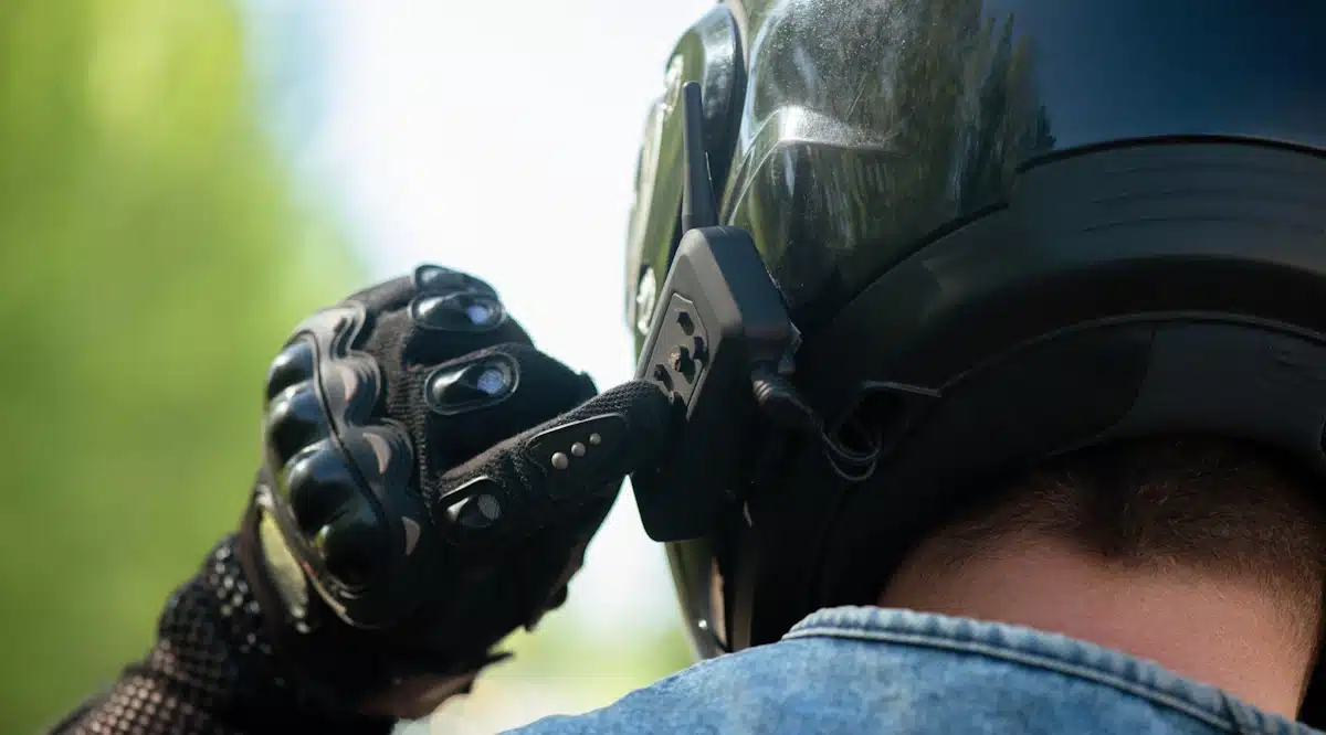 a motorcyclist using headphones