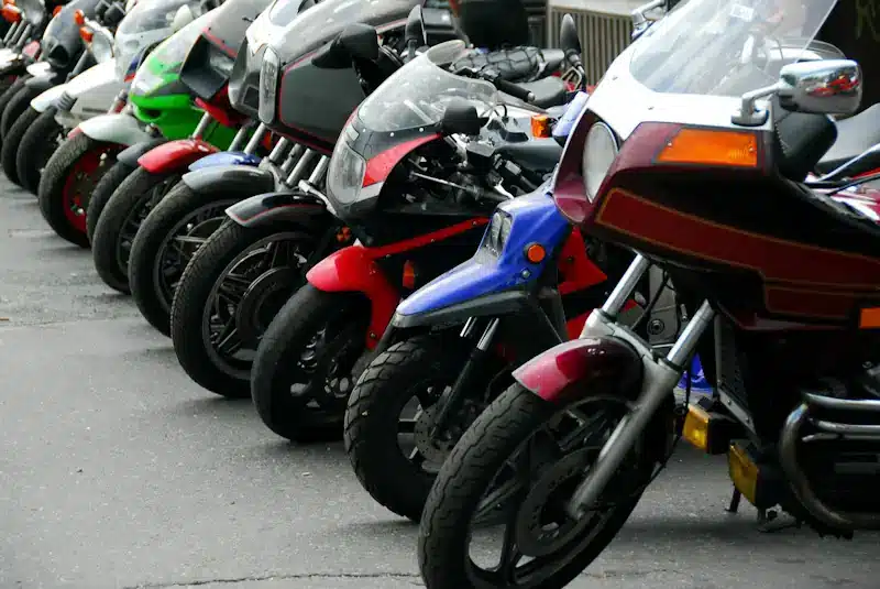 A line of motorcycles at a dealership